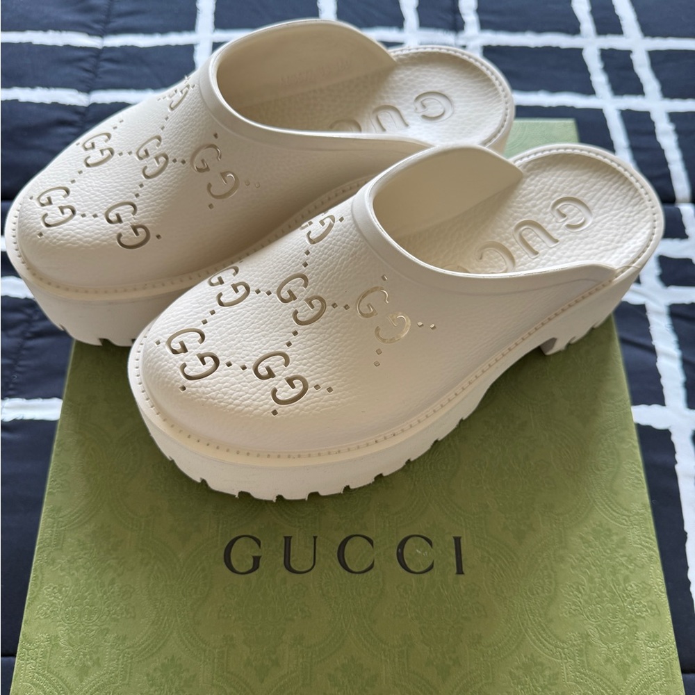 Gucci Cream Mules with Embossed Monogram